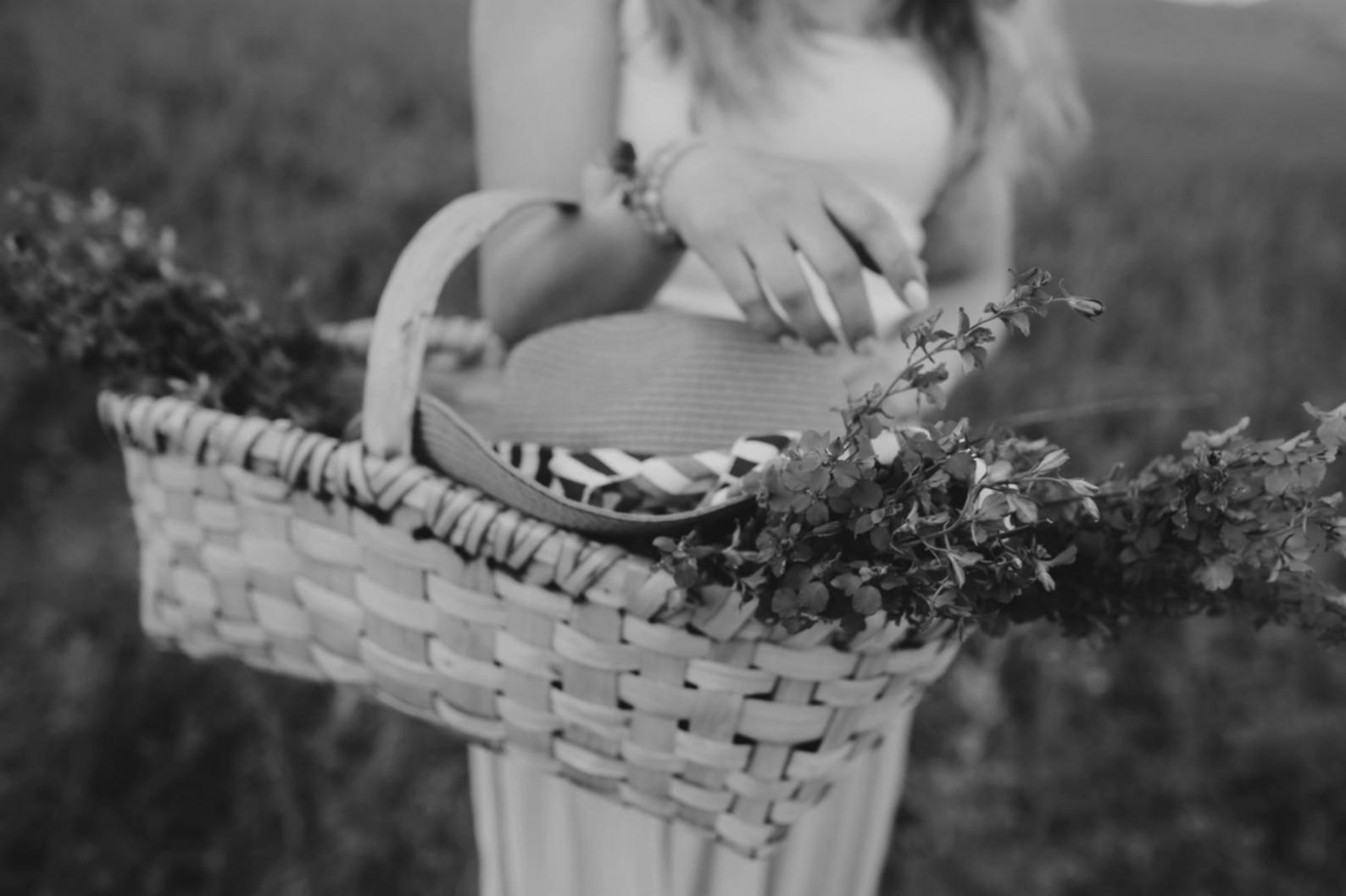 Student working on game development project with multiple monitors showing code and game engine interface